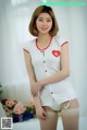 Ye Na hot beauty in nurse-style lingerie (9 photos) P8 No.238aef